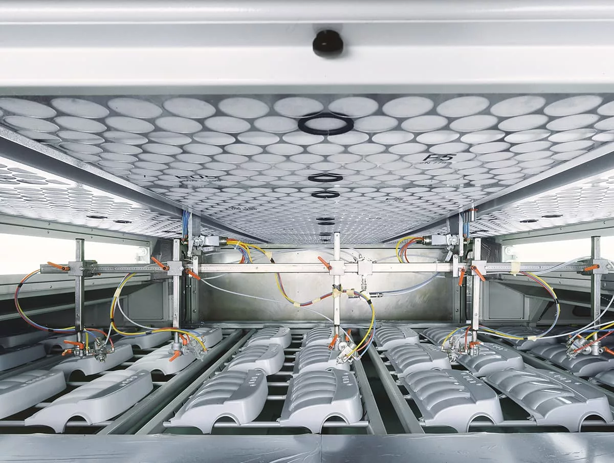 Beschichtung Automotive Teile. Venjakob Maschinenbau.